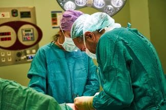 A fit and healthy lifestyle doctor in an operating room