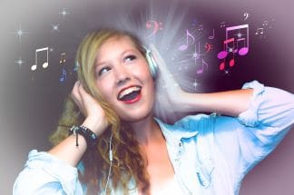 A Fit and Healthy Lifestyle Woman listening to music in a great mood
