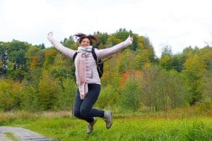 Transforming Life Woman jumping up outdoors