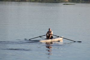 Man rowing a canoe