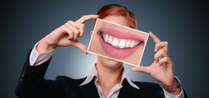 Calcium Woman Showing beautiful teeth