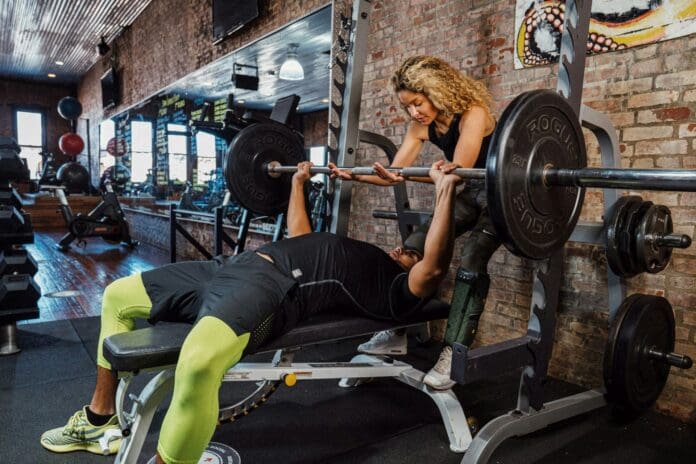 Picture of a man doing a barbell bench press