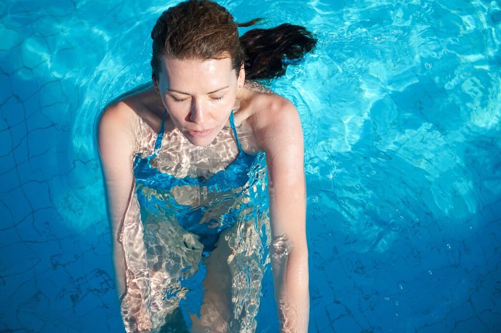 Picture of a woman swimming. Swimming for Exercise, Workout