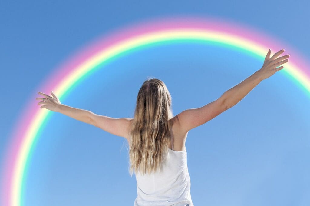 Picture of a woman and a rainbow. Motivation to Live a Fit and Healthy Lifestyle, motivate yourself, Setting goals