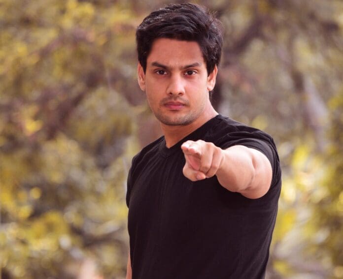 Picture of a man pointing at you