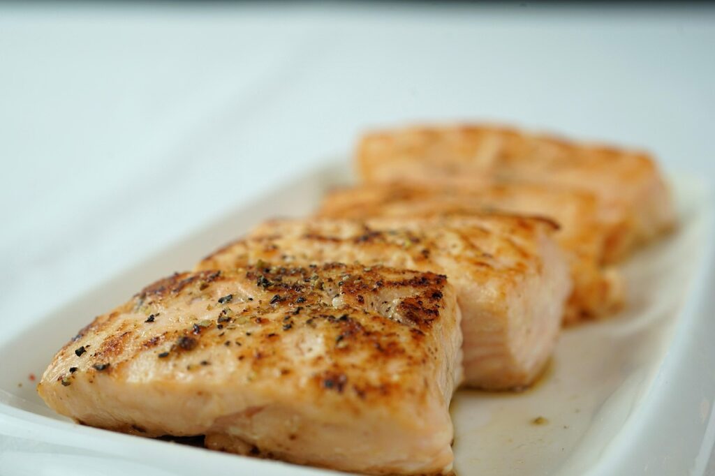 Picture of a plate of cooked fish. Carnivore Diet Benefits, reduced inflammation, energy levels, ketosis