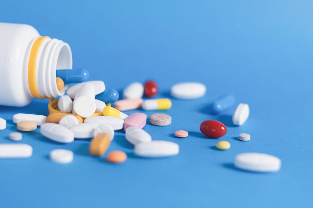 Picture of pills in a bottle. Why The FDA Doesn't Approve Supplements