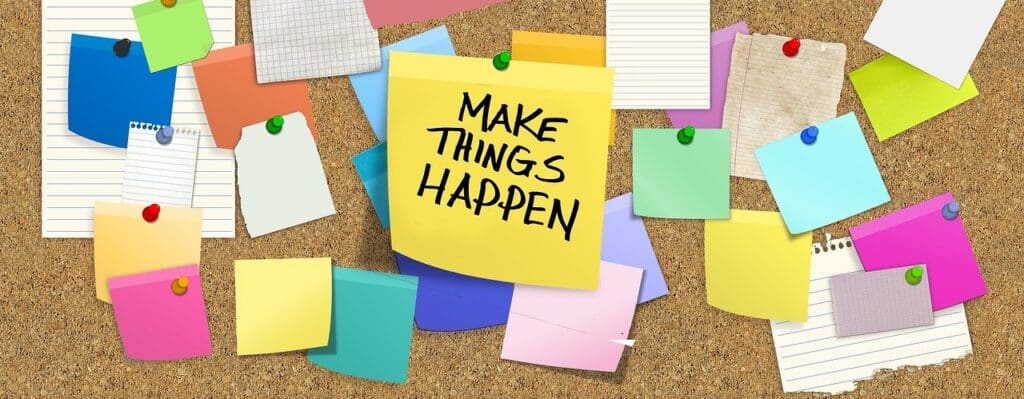 Picture of a bulletin board saying make thins happen.
