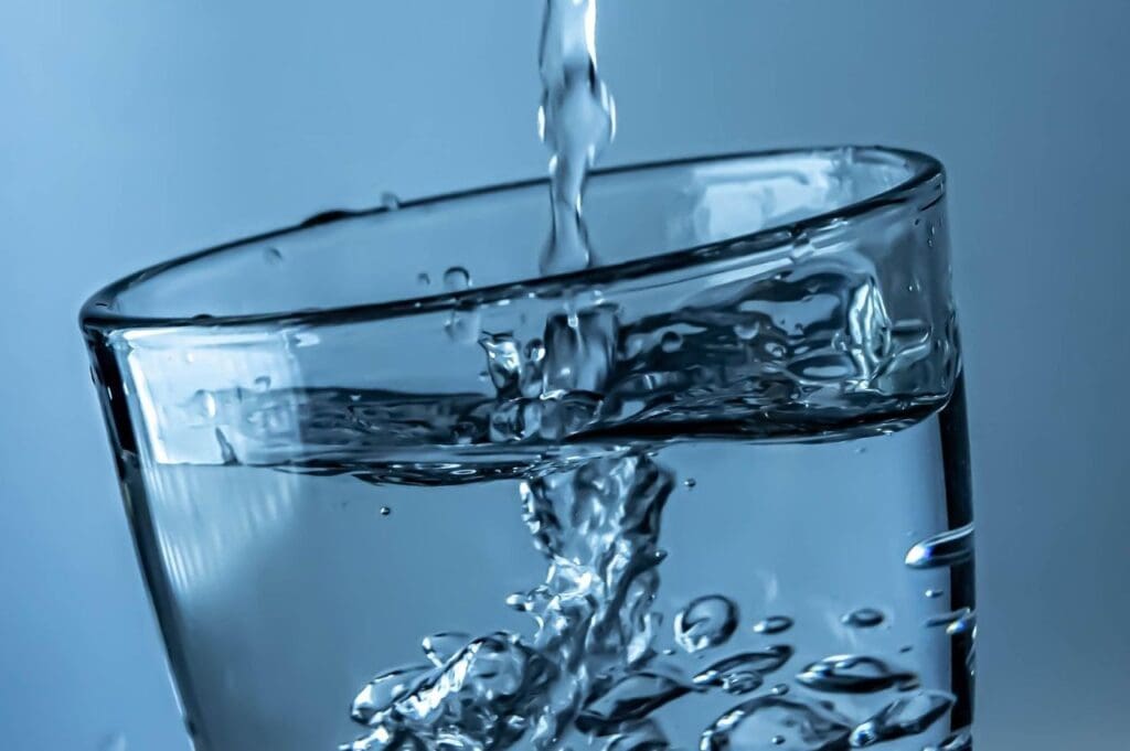 Picture of a glass of water. Dangers of Drinking Soda