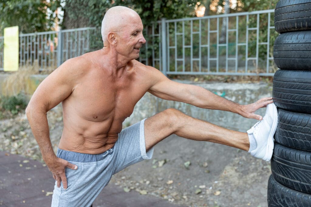 Picture of older muscled man outdoors. How Men Build Muscle Over Age 60
