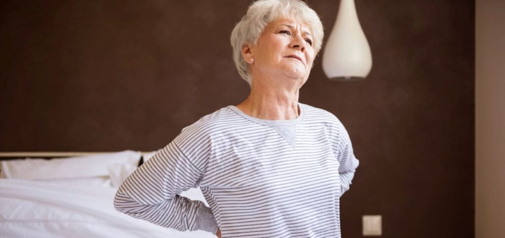 Picture of a woman with osteoporosis. Daily Multivitamins for Women Over 60