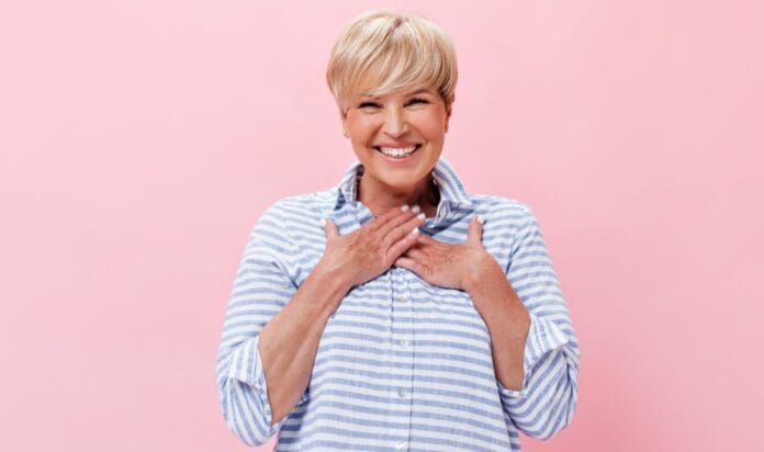 Picture of a happy lady over 60. Daily Multivitamins for Women Over 60